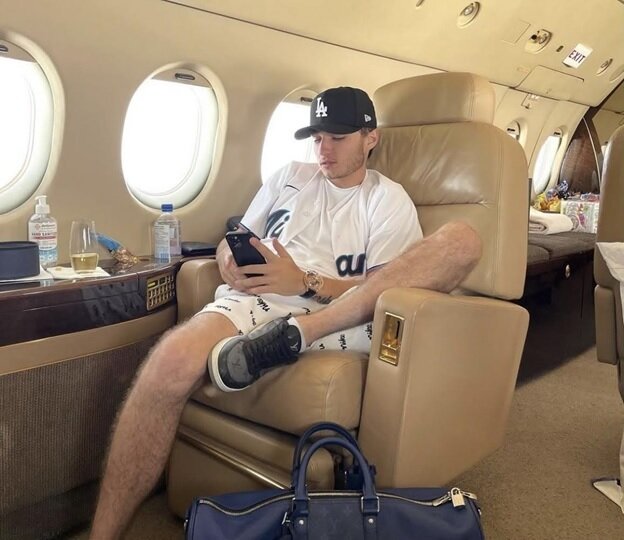 A picture of Aiden Pleterski on a private jet