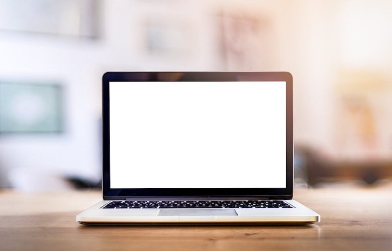 a laptop with a white screen