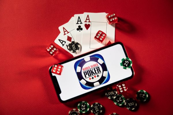 World Series of Poker logo on iPhone display.