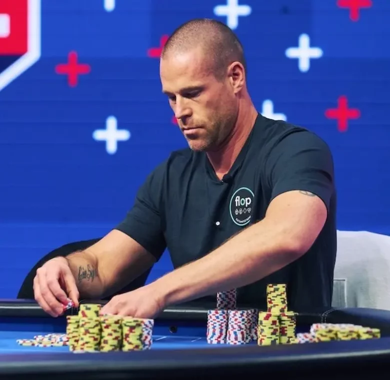 Patrik Antonius looking at his hand