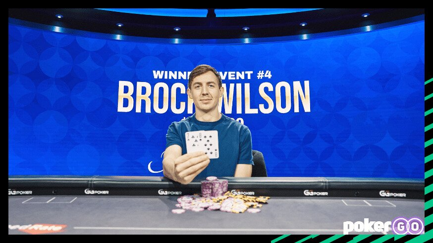 Brock Wilson showing a winning hand of poker.
