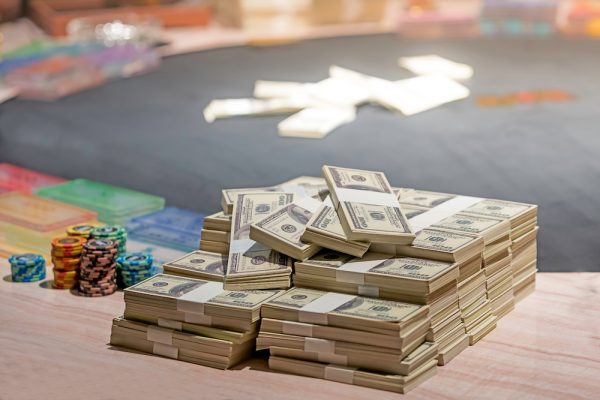 Piles of cash on poker table