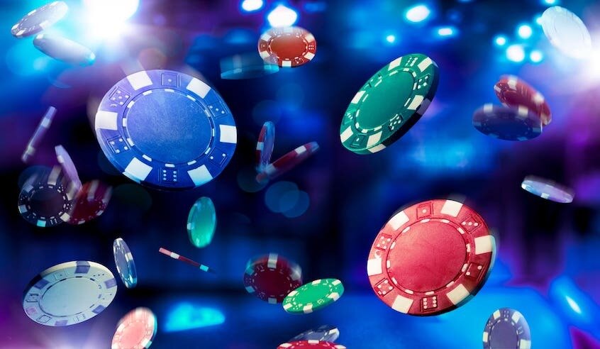 poker chips falling from the sky on a blue background