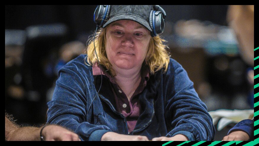 Kathy Liebert with headphones on playing poker