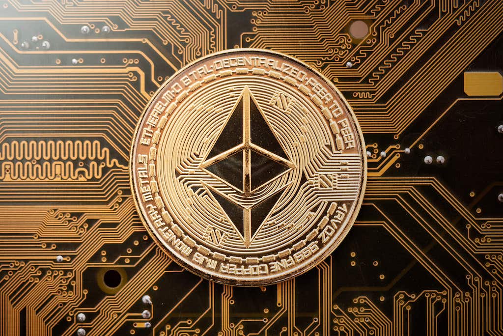 Ethereum coin on a gold background