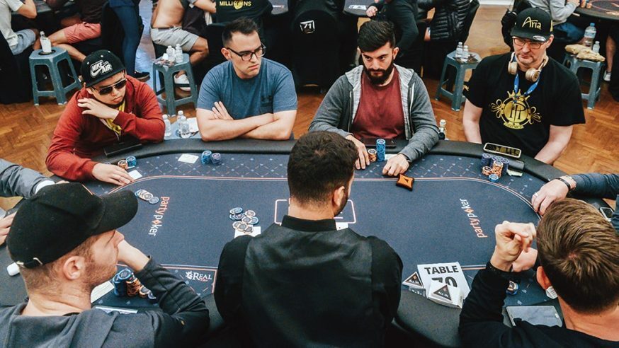Poker Players playing at a table