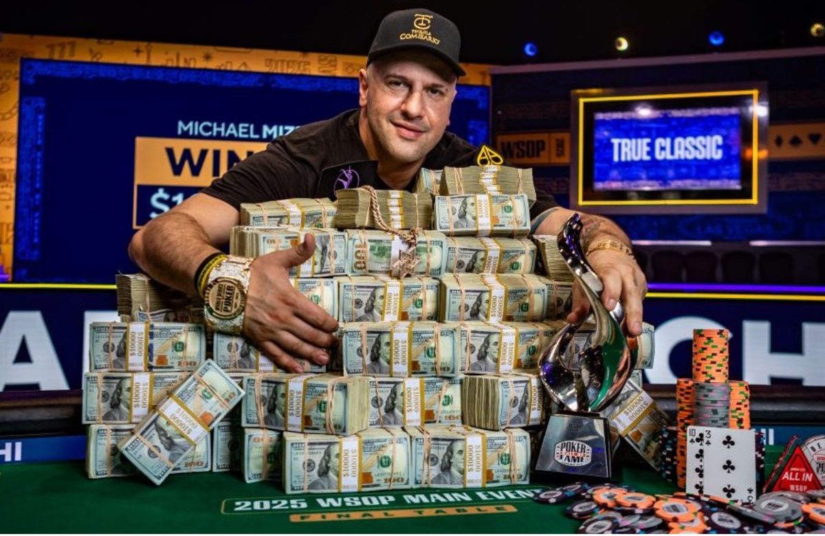 michael mizrachi in front of WSOP winnings