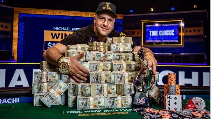 michael mizrachi in front of WSOP winnings