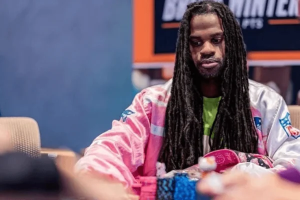 Portrait of Justin Arnwine in a poker table